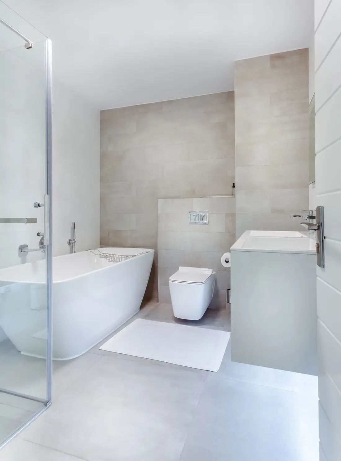Illustrative photo of a white bathroom with a bath. Not a Pure Kitchens bathroom.