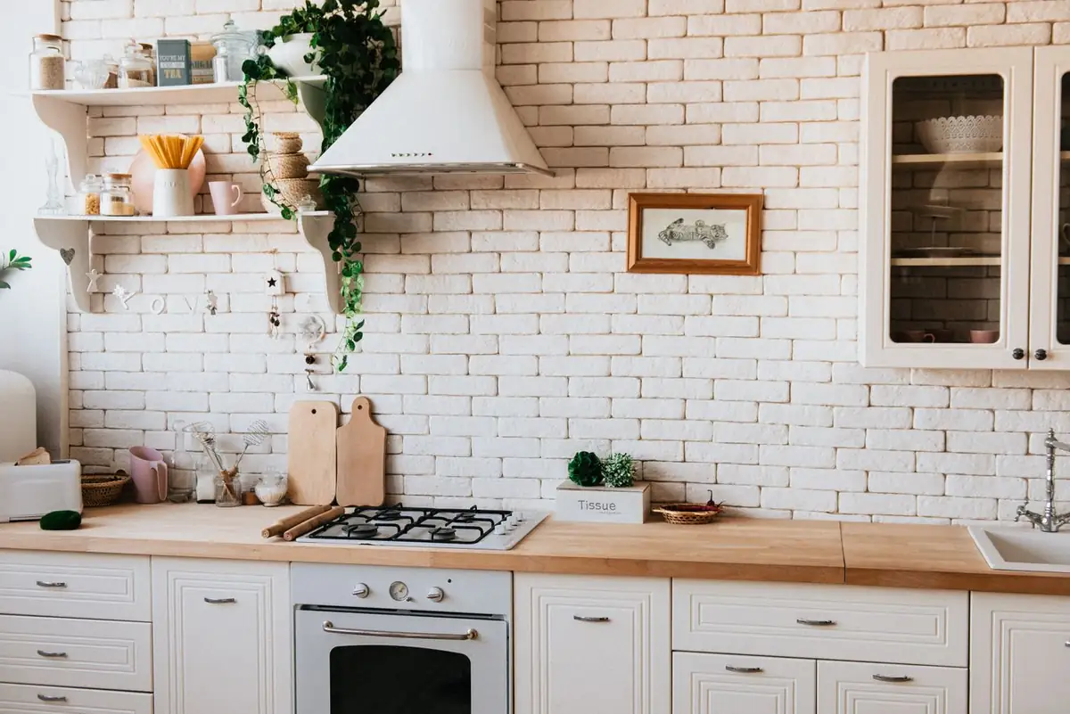 Illustrative photo of a timber kitchen with dark wood cabinets. Not Pure Kitchens joinery.